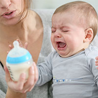 How to Get a Baby to Drink from a Bottle Even When They Refuse To